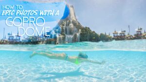woman swimming underwater at Volcano Bay - photgraphed with a GoPro Dome Featured Image for Best GoPro Dome