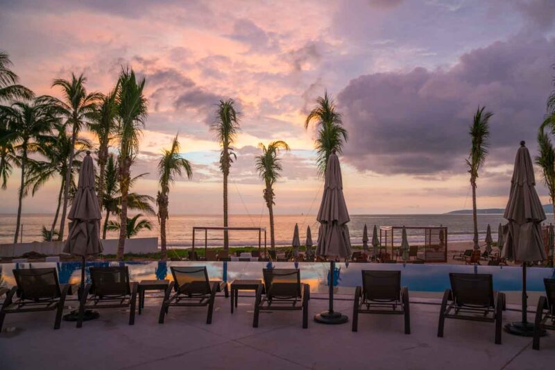 Marival Residences Luxury Resort Sunset at beach club