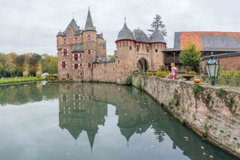 Satzvey Castle reflection in the pond, one of the castles in Germany you can stay in 
