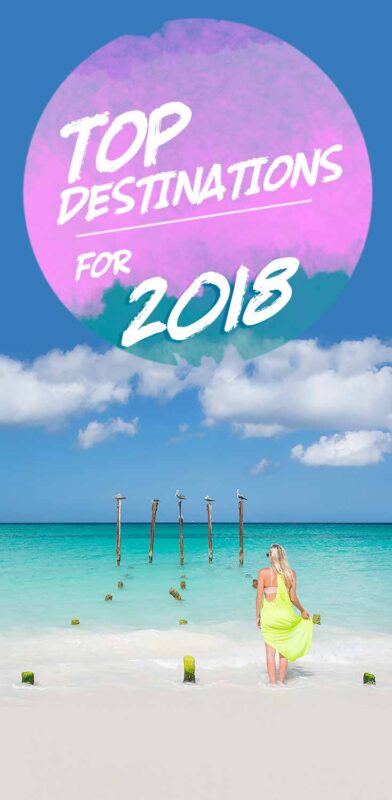 pinterest pin for best places to go in 2018 - woman in Aruba on the beach