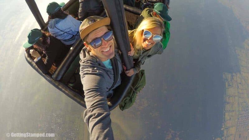 Couple in a hot air balloon ride over Inle Lake Myanmar