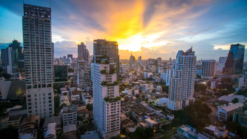 Silom area of Bangkok sysline at sunset - Where to stay in Bangkok