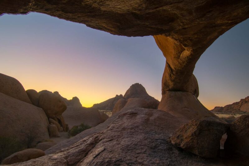 A view from inside the natural stone arch at Spitzkoppe in Namibia