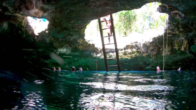 view of the ladder in cenote Calavera near Tulum