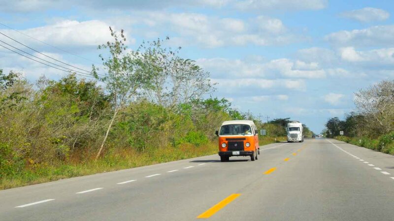 Van drives on the road to Coba and Tulum in Q Roo Mexico - Is it safe to drive in Cancun Mexico