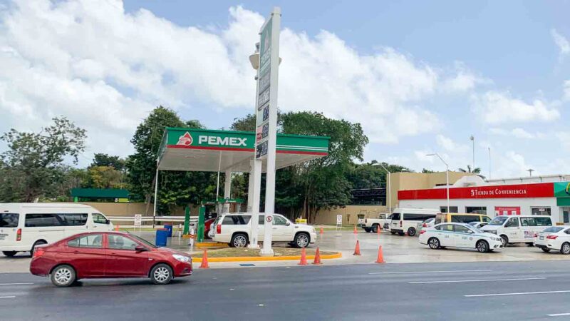 Gas Station at Cancun Airport with rental cars and cars