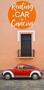 Pinterest pin for Renting a car in Cancun Mexico - Red VW bug parked in front of a building