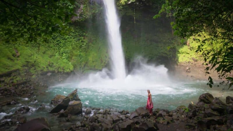 Girl at La Fortuna Waterfall Base