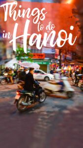 A Vietnamese Man riding a motorbike - pinterest pin for things to do in Hanoi Vietnam