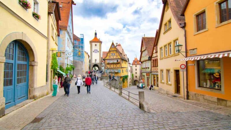 The best photo area along the romantic road in Germany in Rothenburg - cobblestone streets and old city walls and tower