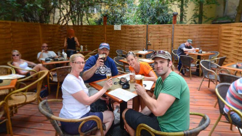 family having a beer at a beer garden in Prague
