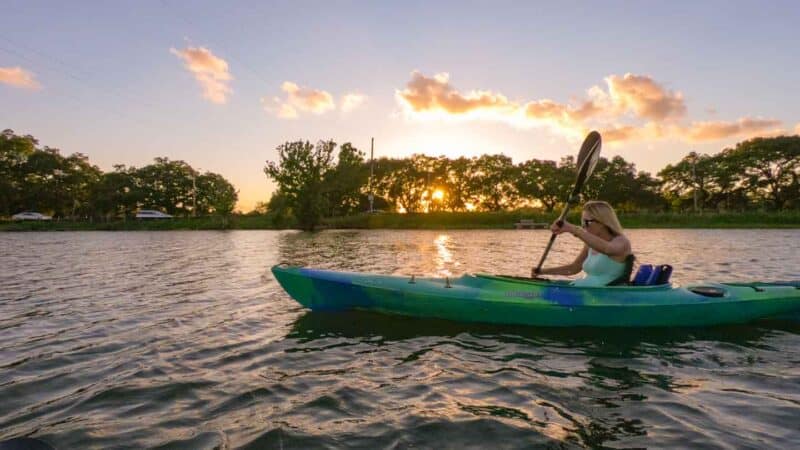 girl kayaking on a weekend in New Orleans