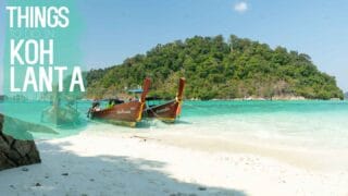 featured image for things to do in Koh Lanta Thailand - Longtail boats in front of Thai Island