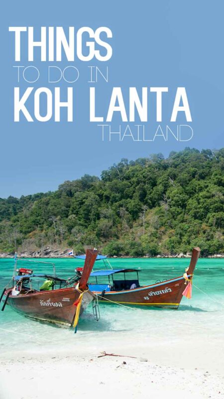 Pinterest Pin for top things to do in Koh Lanta Thailand - Two longtil boats in the Andaman sea