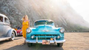 Girl in front of a 1953 Chevy Bel Air HWY 1