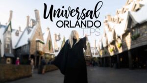 Featured image for Universal Orlando Tips - woman in a Harry Potter Cape in Hogsmead