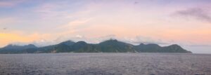 panoramic picture of the island of Dominica at sunset - Best Islands
