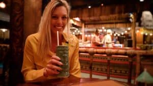 Girl have a drink at the Tonga Room tiki bar in San Francisco