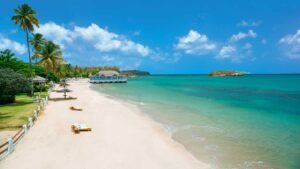 Empty white sand beach at Sandals Halcyon Beach Luxury Resort in St. Lucia - Top Resorts