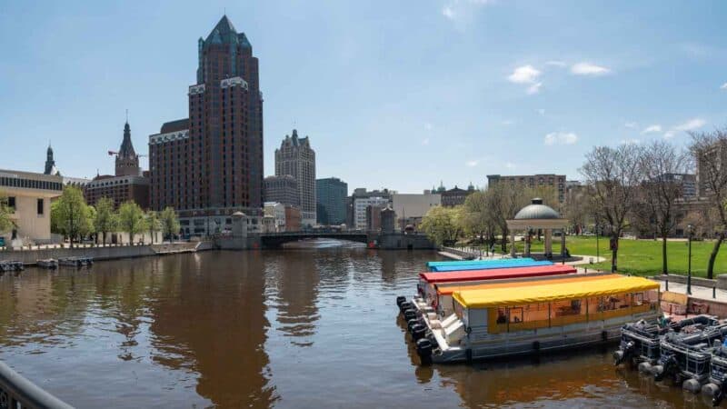 Brewery tour boats parked in the river - Best Brewery Tours in Milwaukee