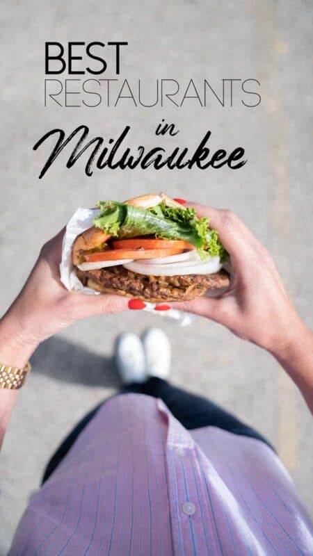 Pinterest pin for best restaurants in Milwaukee - Woman holding a burger - Local favorite places to eat