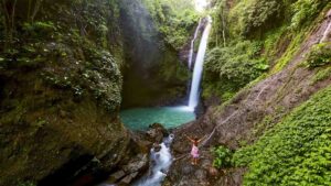 Girl at Aling Aling Waterfall in Bali
