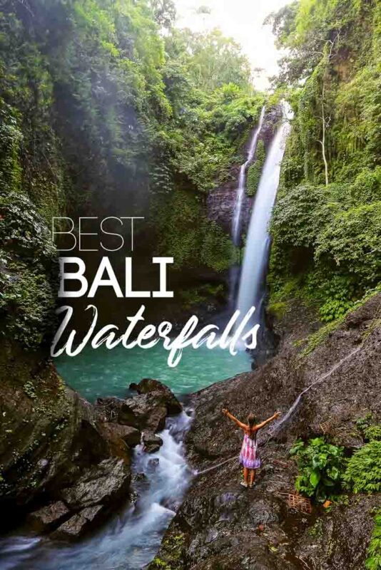 Pinterest Pin for Best Waterfalls in Bali Indonesia - Woman standing in front of a waterfall in Bali