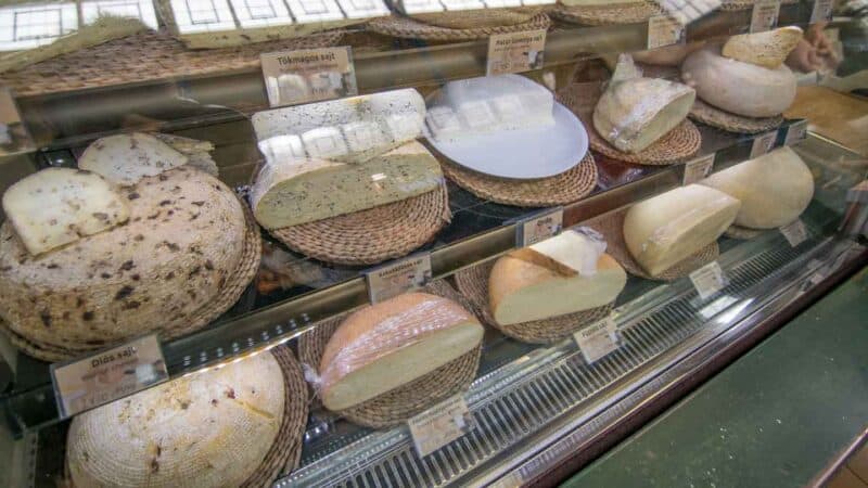 Glass case of cheese at the Cheese stall inside the Great Market Hall in Central Budapest