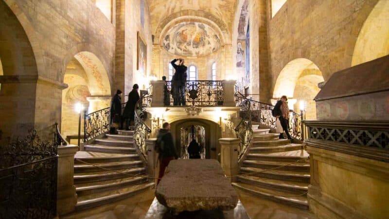 Two stone staircases leading to the Alter of the St. Georges Basilica inside the Prague Castle