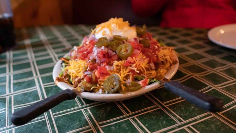 Plate of "Indian Tacos" - made with Native American Fry Bread, covered in Tex-Mex toppings at Cheyenne Crossing , SD