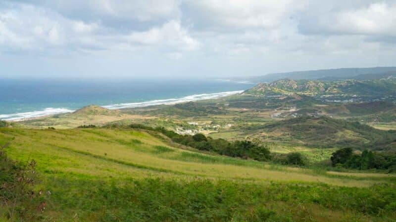 view from Cherry Tree Hill Road - big vista with green hills rolling down to the Caribbean Sea - Things to do in Barbados