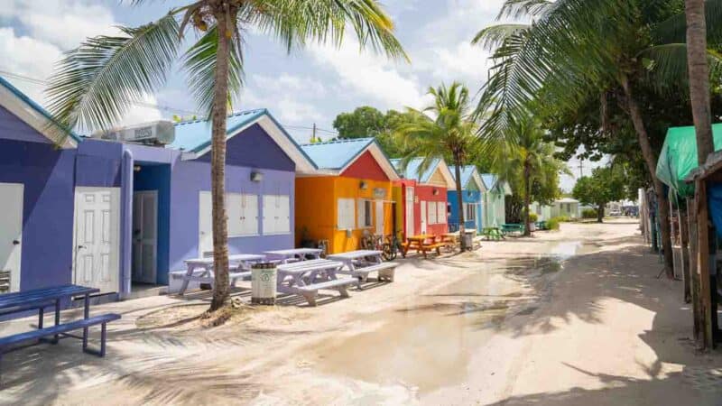 colorfulfully painted small houses that make up the Oistins fish market