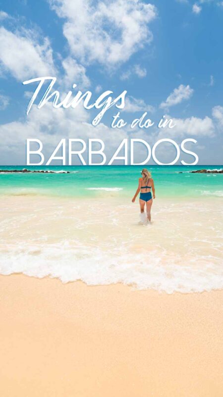 woman walking on the beach in Barbados for Pinterest image for things to do in Barbados Guide