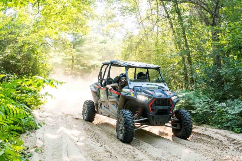Polaris Adventures Bear Bogging ATV Rentals Wisconsin side view motion blur 2