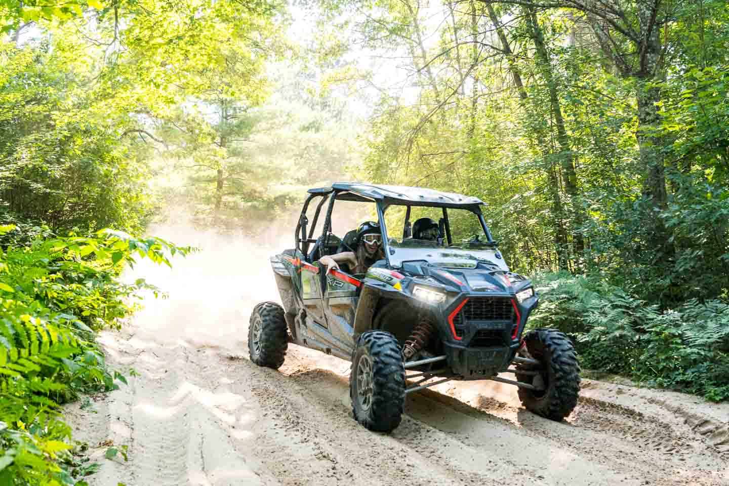 Polaris Adventures Bear Bogging ATV Rentals Wisconsin side view motion blur2 GETTING STAMPED