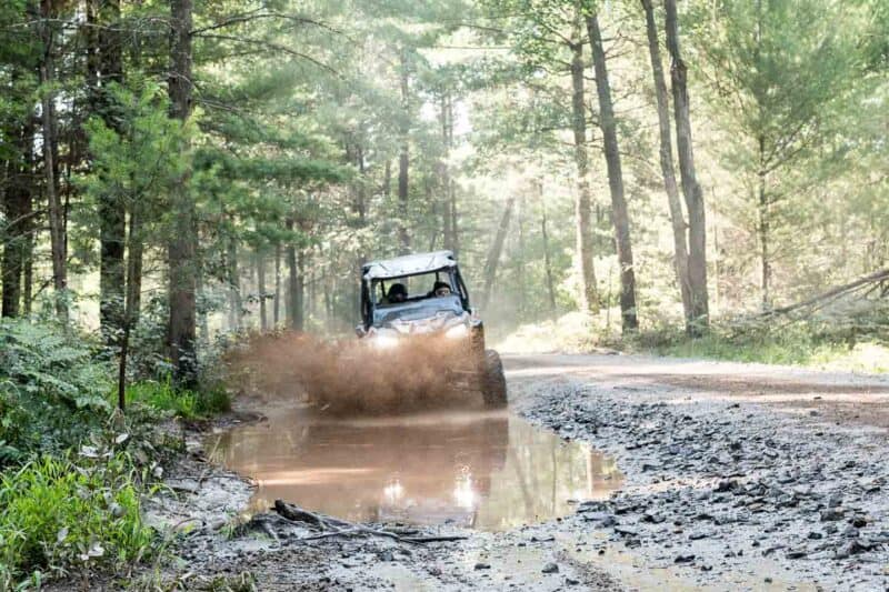 Polaris Adventures Bear Bogging ATV Rentals Wisconsin side view motion blur 3