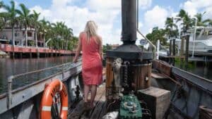Woman riding in the African Queen Boat in Key Largo - Top Road Trip attractions