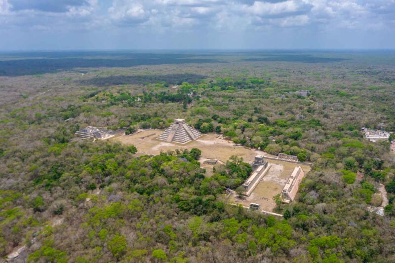 Broad aerial view of Chichen Itza showing the main pyramids and other structures