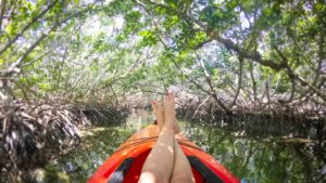 Woman with her feet up in a kayak tour of Key West - Things to do in Key West