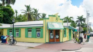 Green and yellow exterior of Kermit's Key West Lime Pie Shoppe - Places to eat in Key West