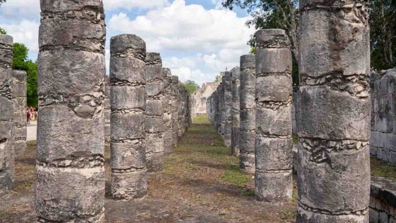 view looking down a row of columns at the Warrior's Temple at the Chichén Itzá