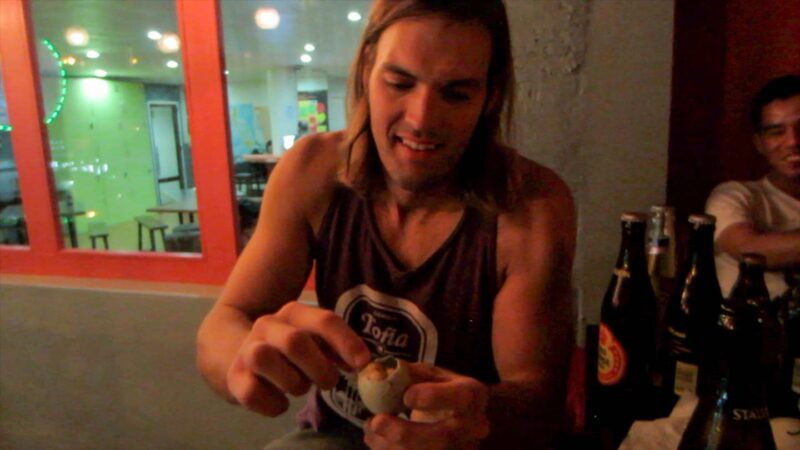 Man eating a Balut Egg in the Philippines - Top things to try