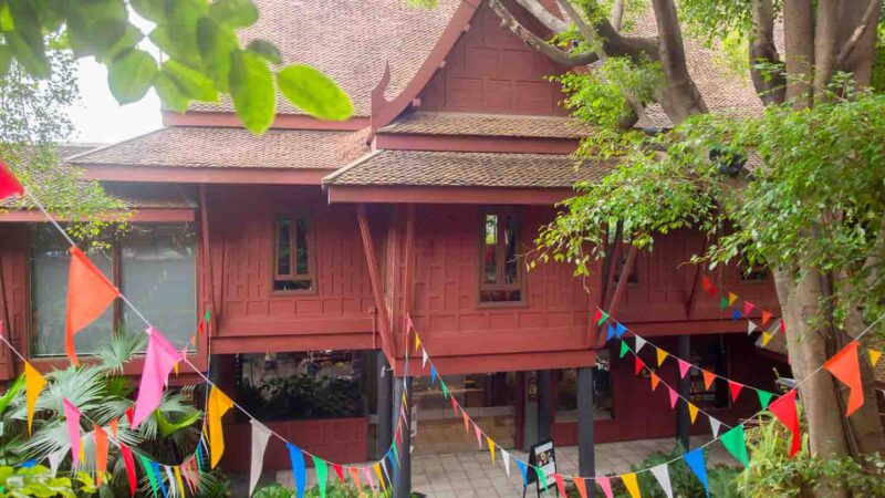 Red exterior of the Jim Thompson House Silk museum - Top Tourist sights in Bangkok