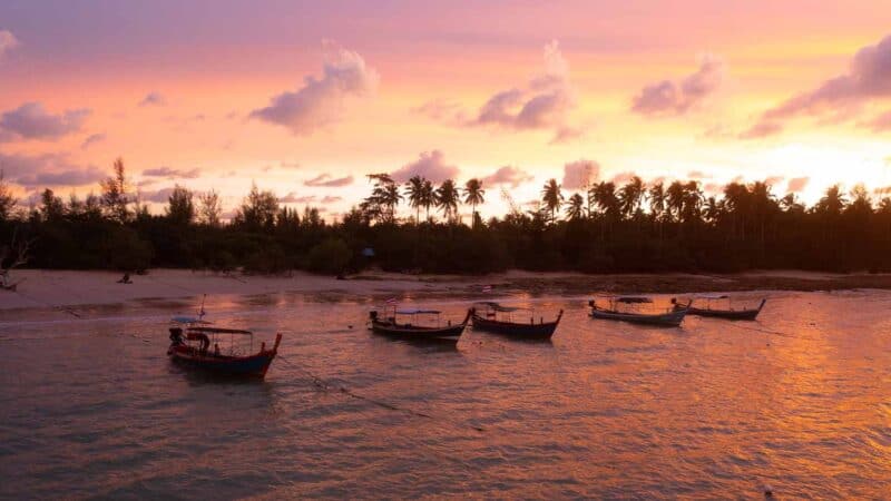 Kaho Lak Thailand Sunset with Long Tail Boats