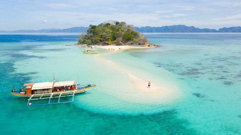 Man on Bulog Dos Island in near Coron - Things to do in the Palawan Islands