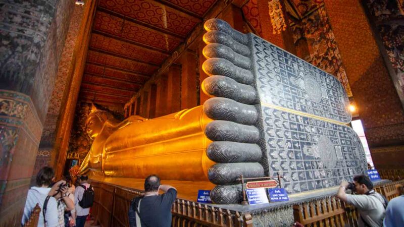 Giant statue of reclining buddha located in Wat Pho - Bangkok top sights