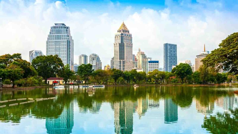 reflection of buildings in the lake in Lumpini Park - Outdoor activities in Bangkok