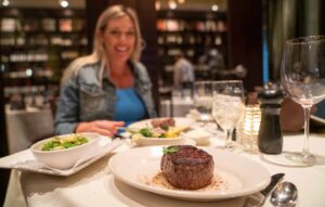 Woman dining at Opus 9 - Best Steak Restaurant in Williamsburg VA