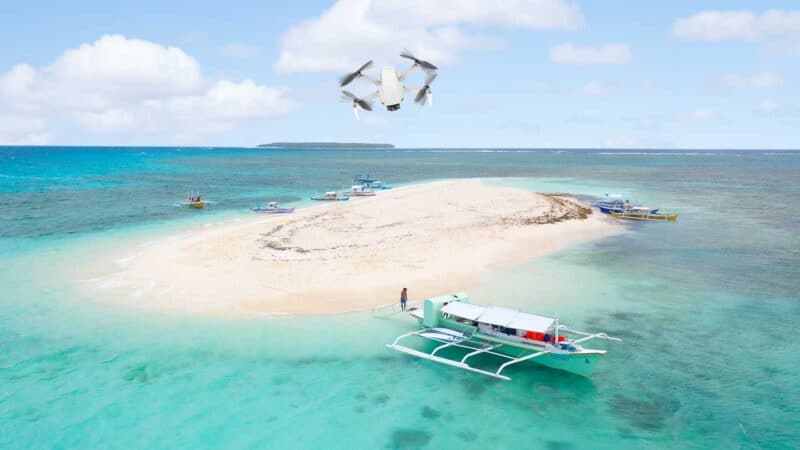 DJI Mavic Mini flying over a small island in the Philippines - Best Travel Drone