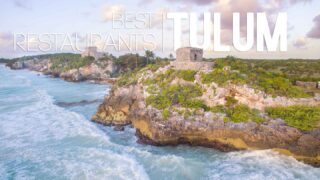Aerial view of the Tulum Ruins with white text 